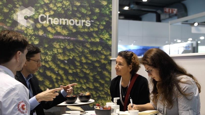 People talking in a Chemours meeting space
